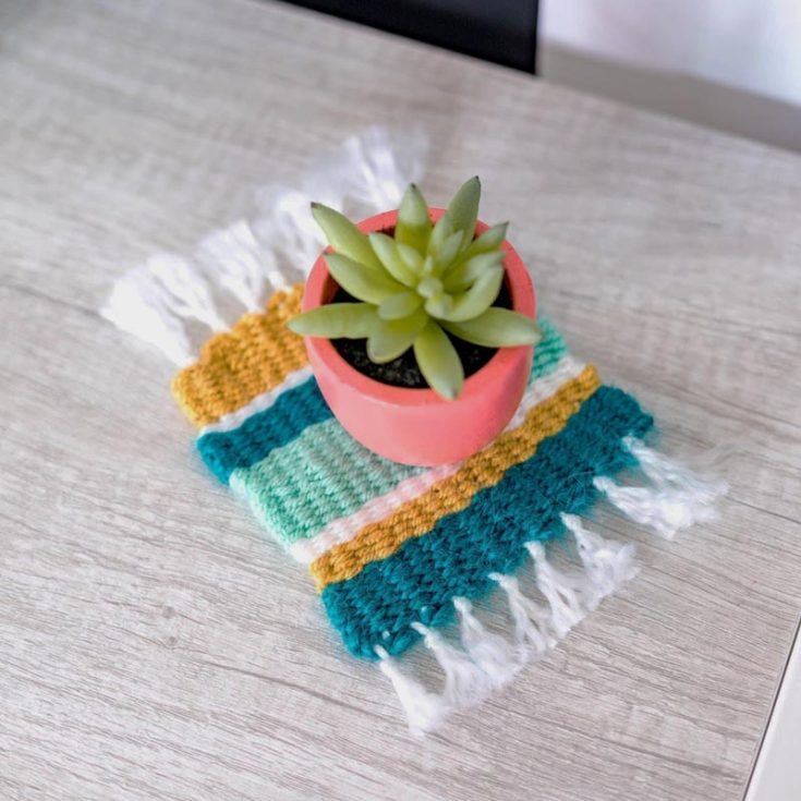 This project is essentially a tiny rug for your mug, and it is adorable! You can customize this at your own pace with any pattern or colors you prefer. Make a bigger one as a plant coaster or trivet for your pots and pans.